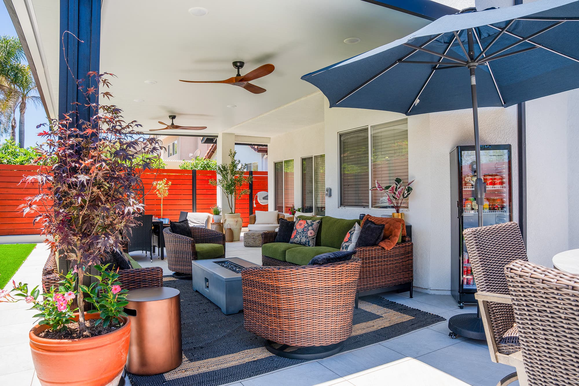 Backyard remodel with artificial turf, pavers and patio cover