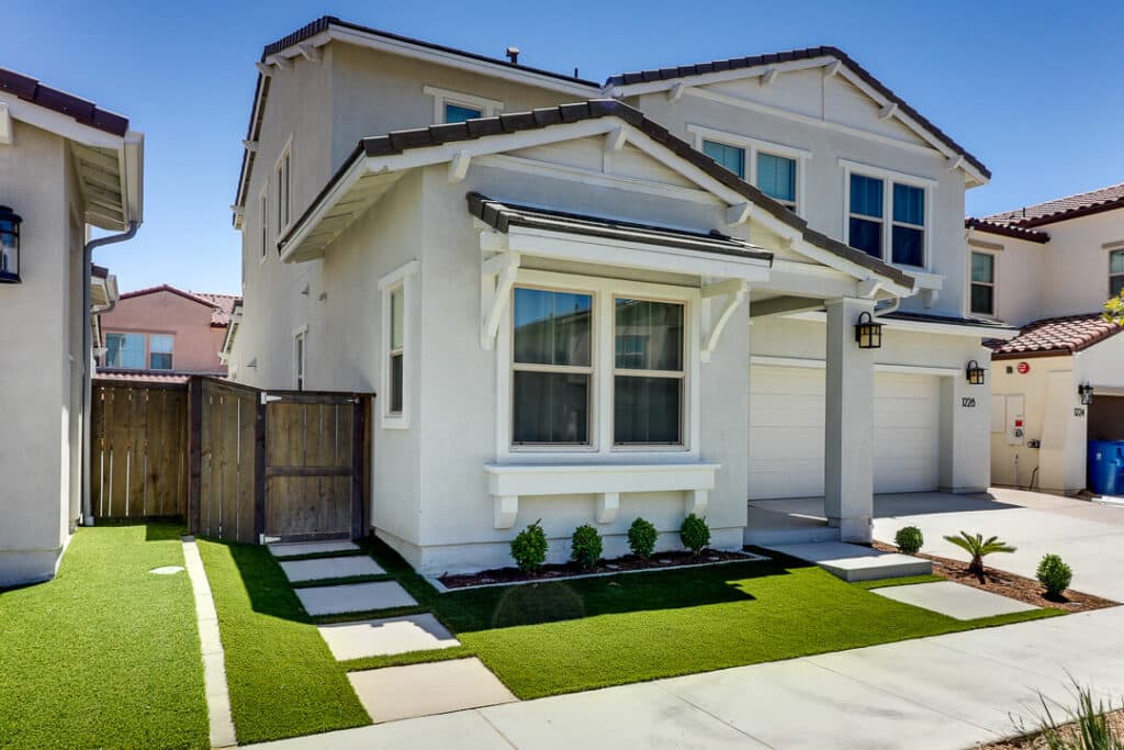 Landscape with Artificial Turf and Stepping Stones