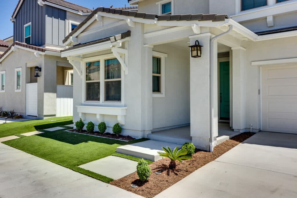 Landscape with Artificial Turf and Stepping Stones 3