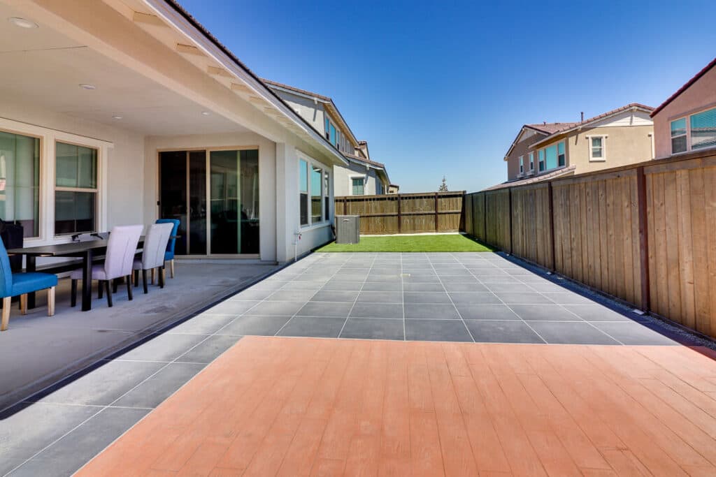 Porcelain Pavers plus Composite Decking and Artificial Turf Backyard