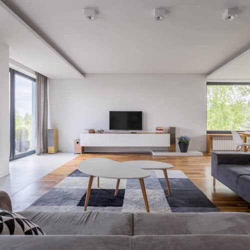 Granny Flat Construction. Flats interior view designed with large windows and white walls
